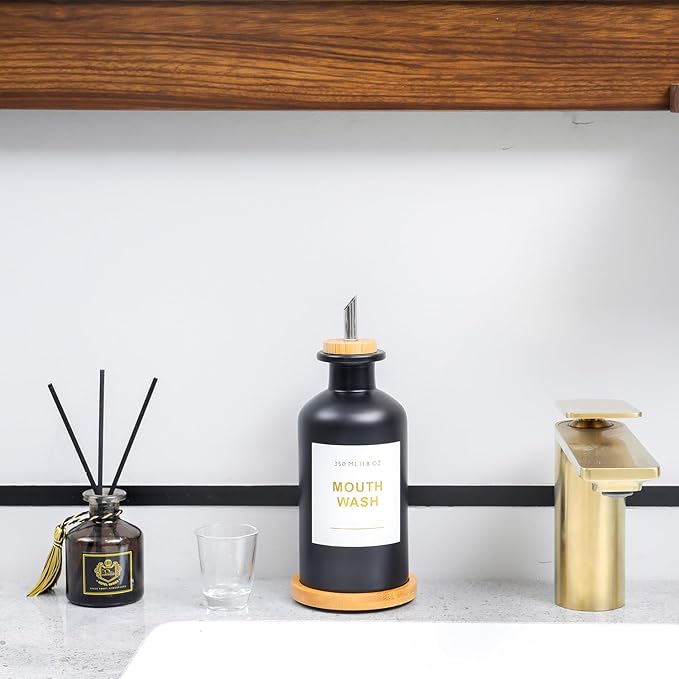 11.8OZ Glass Mouthwash Dispenser for Bathroom with Stainless Steel & Bamboo Nozzle, Mouthwash Cup Reusable, Bamboo Tray, and Elegant Gold Sticker.(Black)