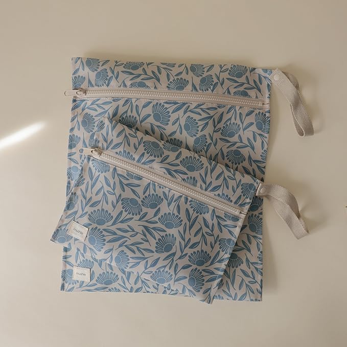mushie Water Resistant Wet Bags | Large & Small Reusable Storage Bag for Baby Items and Travel | Zippered Pockets with Handle | Machine Washable, Set of 2 (Blue Flowers)