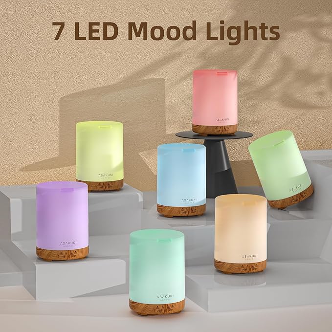 ASAKUKI Essential Oil Diffuser, Aromatherapy Cool Mist Home Humidifier with 7 LED Color Changing Light and Auto-Off Safety Switch, 6 Essential Oils Set, 300ml (Brown with Oils)
